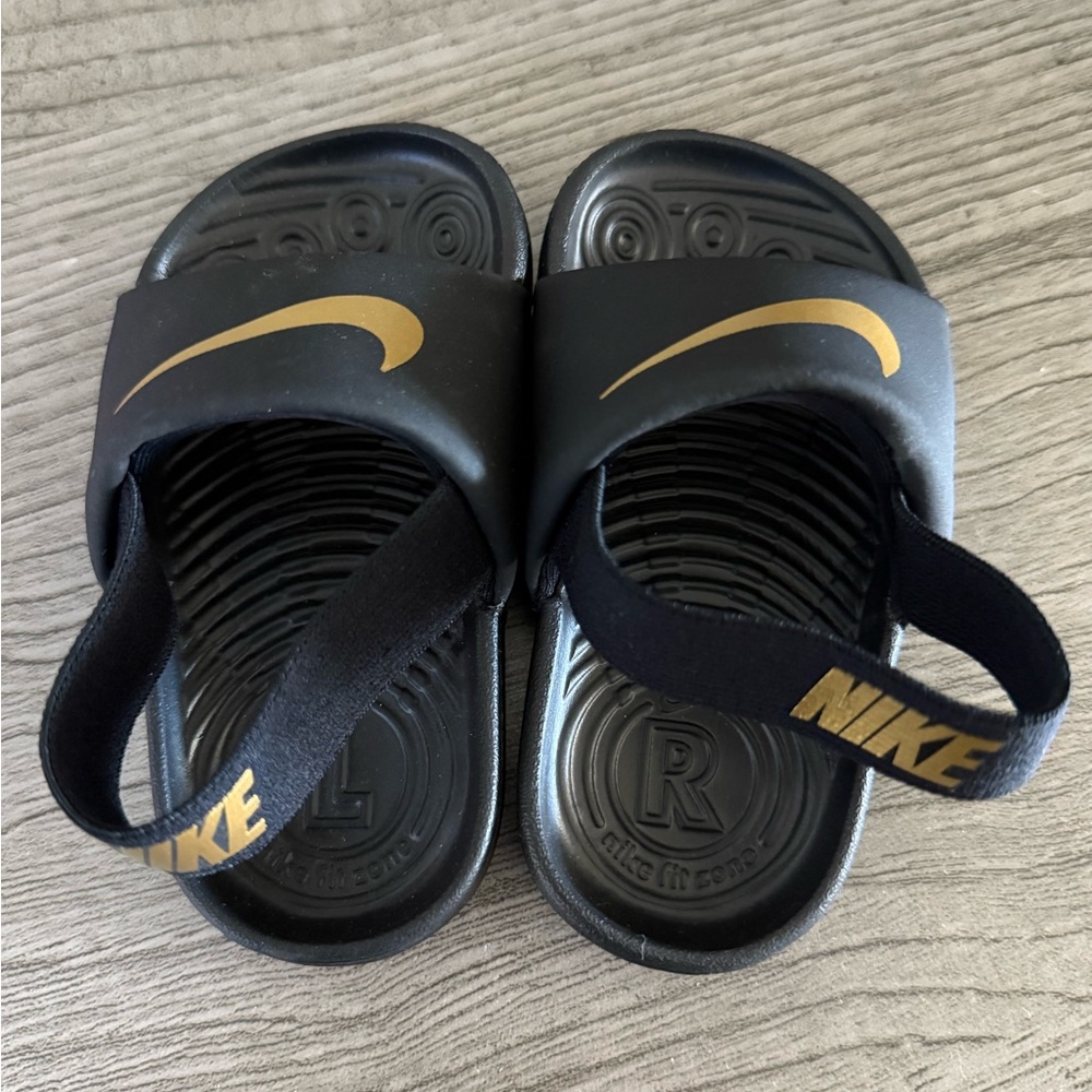 Nike Black and Gold Sandals with Textured Footbed